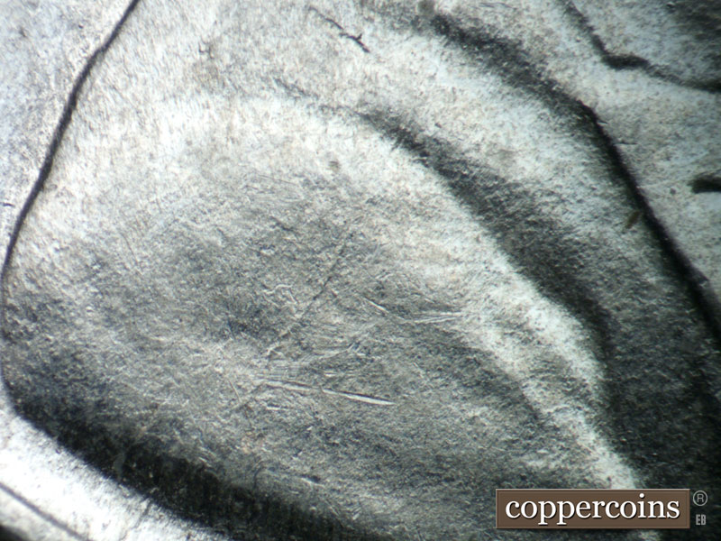 Die-stage C marker on 1943P•1DO•008 (1943 Doubled Die Obverse).