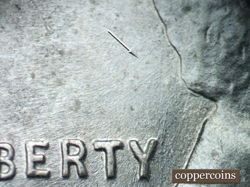 Die-stage C marker on 1943P•1DO•008 (1943 Doubled Die Obverse).