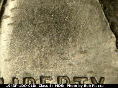 Die-stage B marker on 1943P•1DO•010 (1943 Doubled Die Obverse).
