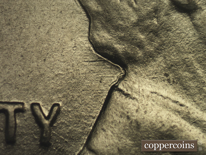 Die-stage B marker on 1943P•1DO•015 (1943 Doubled Die Obverse).