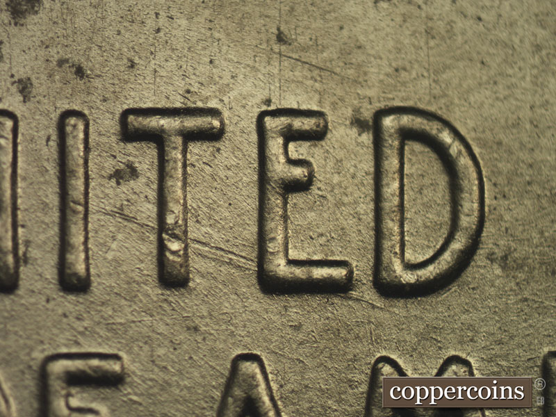 Die-stage B marker on 1943P•1DO•015 (1943 Doubled Die Obverse).