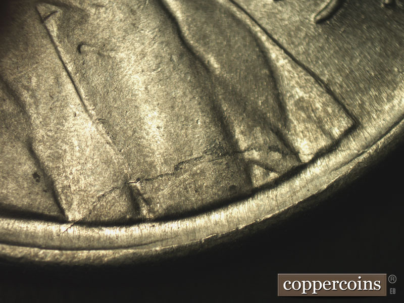 Die-stage B marker on 1943P•1DO•018 (1943 Doubled Die Obverse).