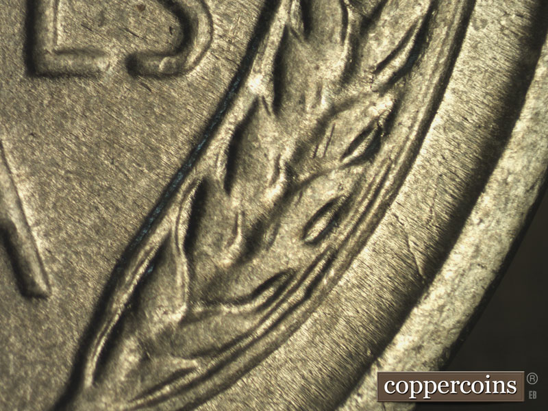 Die-stage B marker on 1943P•1DO•018 (1943 Doubled Die Obverse).