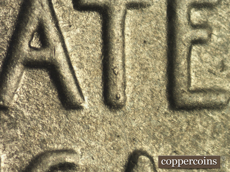 Die-stage B marker on 1943P•1DO•018 (1943 Doubled Die Obverse).