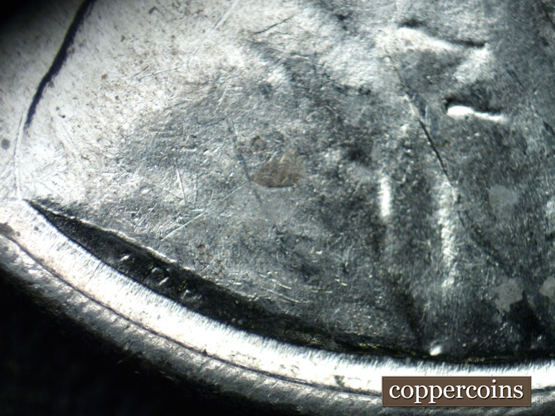 Die-stage B marker on 1943P•1DO•019 (1943 Doubled Die Obverse).