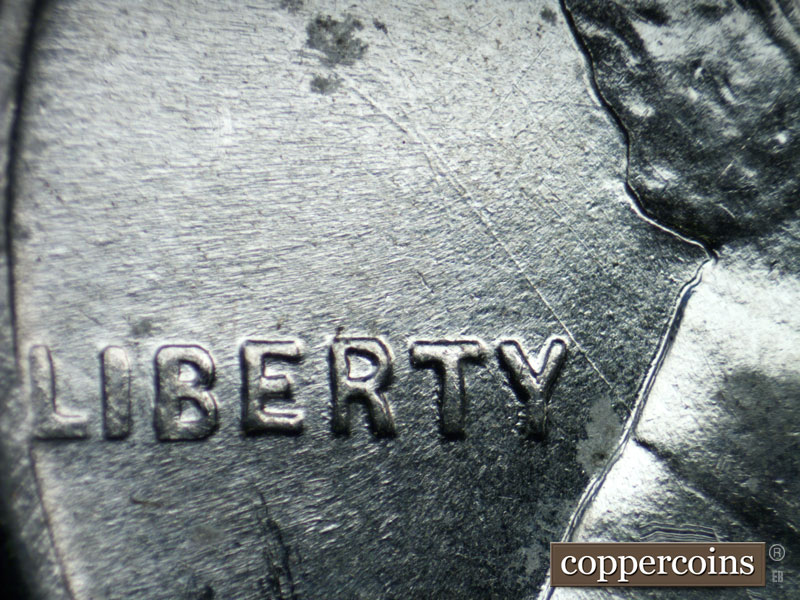 Die-stage B marker on 1943P•1DO•019 (1943 Doubled Die Obverse).