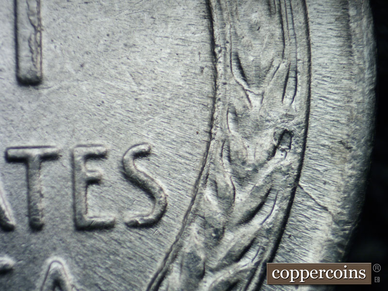 Die-stage B marker on 1943P•1DO•019 (1943 Doubled Die Obverse).