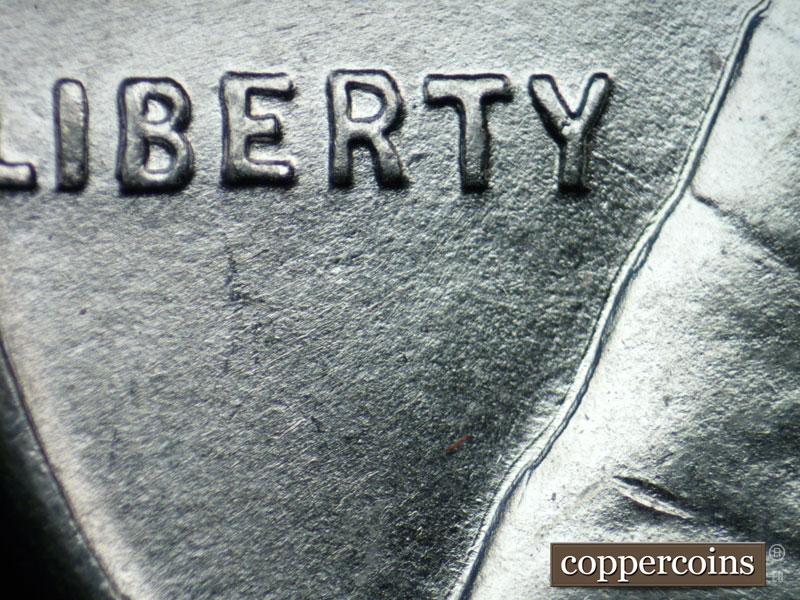 Die-stage B marker on 1943P•1DO•020 (1943 Doubled Die Obverse).