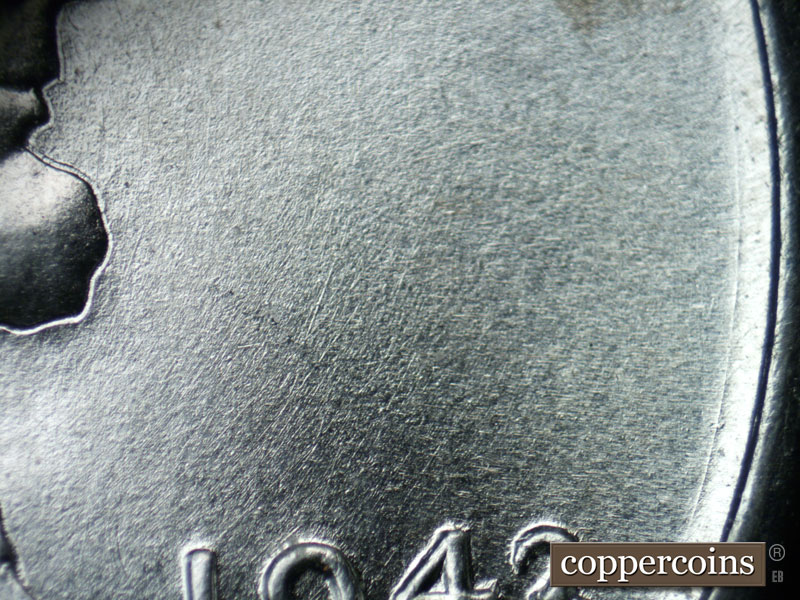 Die-stage B marker on 1943P•1DO•020 (1943 Doubled Die Obverse).