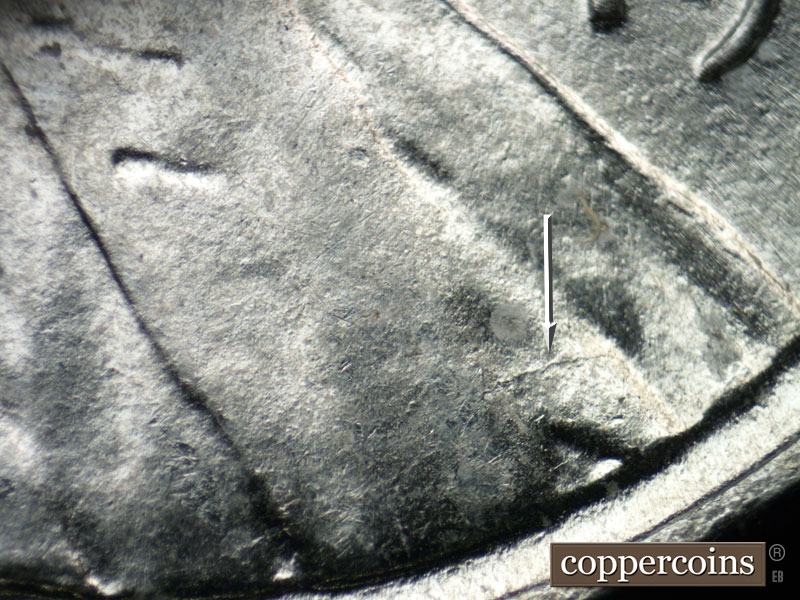 Die-stage B marker on 1943P•1DO•021 (1943 Doubled Die Obverse).