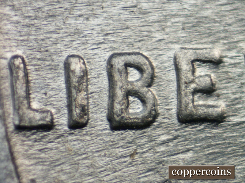 Die-stage C marker on 1943P•1DO•022 (1943 Doubled Die Obverse).
