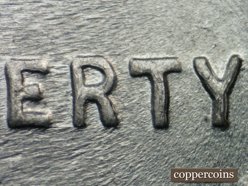 Die-stage C marker on 1943P•1DO•022 (1943 Doubled Die Obverse).