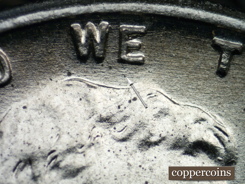 Die-stage B marker on 1943P•1DO•023 (1943 Doubled Die Obverse).