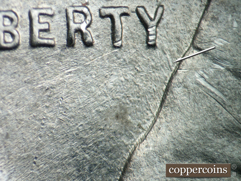 Die-stage B marker on 1943P•1DO•024 (1943 Doubled Die Obverse).