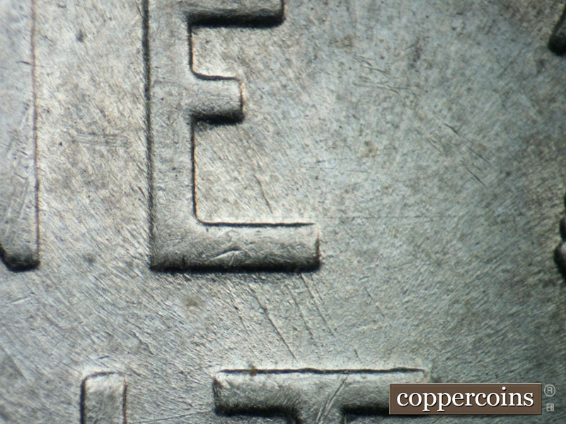Die-stage B marker on 1943P•1DO•024 (1943 Doubled Die Obverse).
