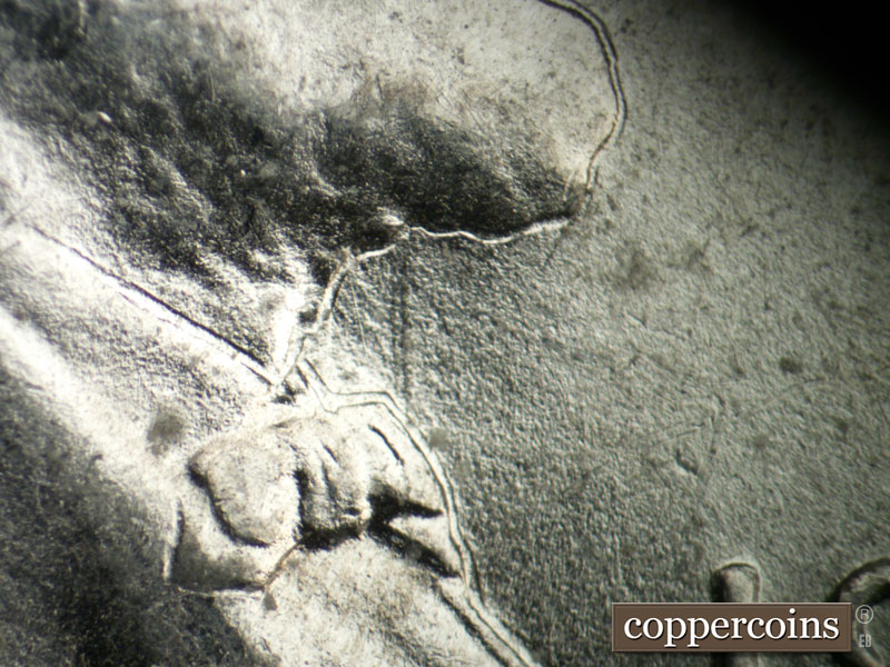 Die-stage B marker on 1943P•1DO•026 (1943 Doubled Die Obverse).
