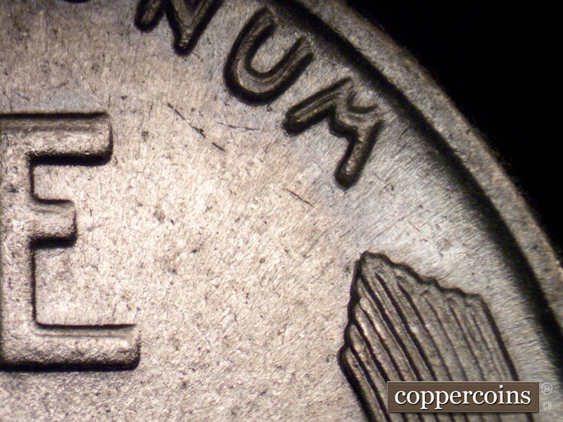Die-stage B marker on 1943P•1DO•027 (1943 Doubled Die Obverse).