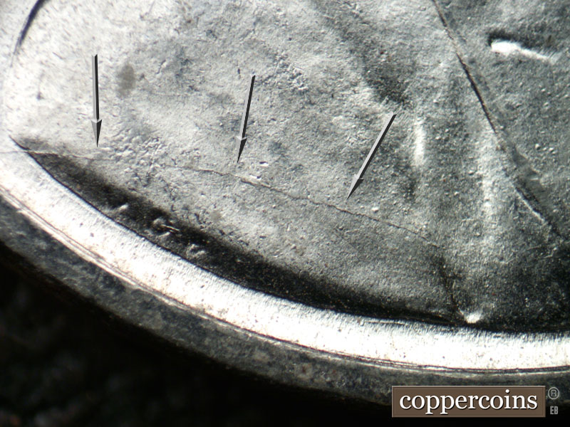 Die-stage B marker on 1943P•1DO•028 (1943 Doubled Die Obverse).