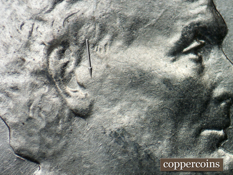 Die-stage B marker on 1943P•1DO•028 (1943 Doubled Die Obverse).