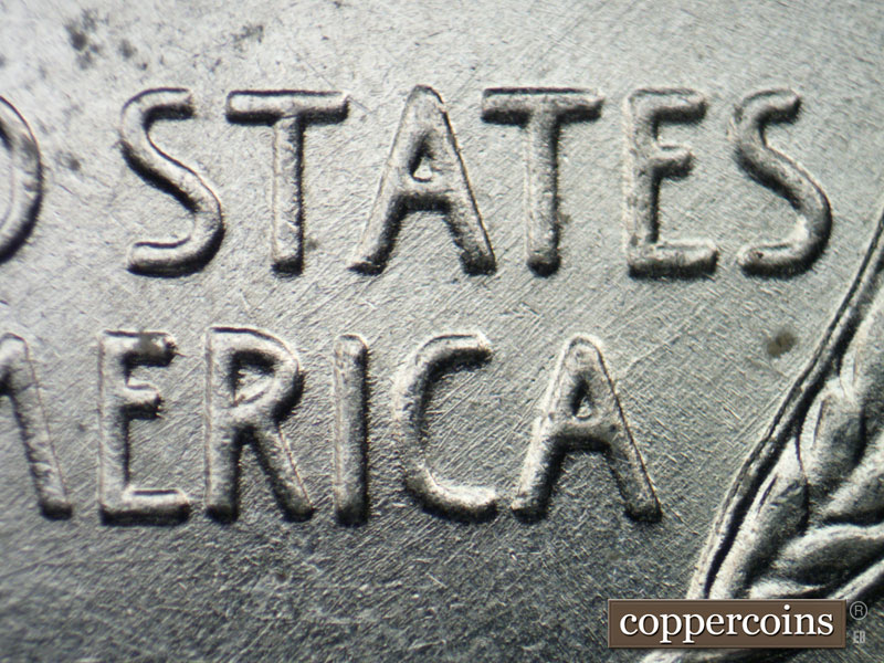Die-stage B marker on 1943P•1DO•028 (1943 Doubled Die Obverse).