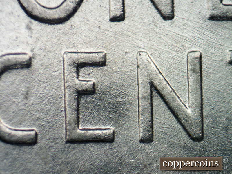 Die-stage B marker on 1943P•1DO•028 (1943 Doubled Die Obverse).