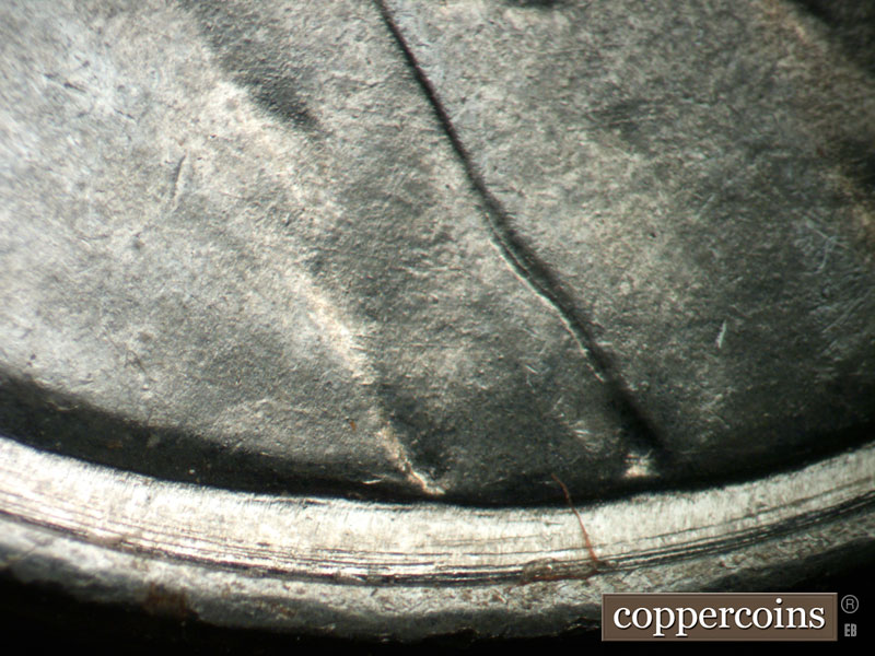 Die-stage B marker on 1943P•1DO•029 (1943 Doubled Die Obverse).