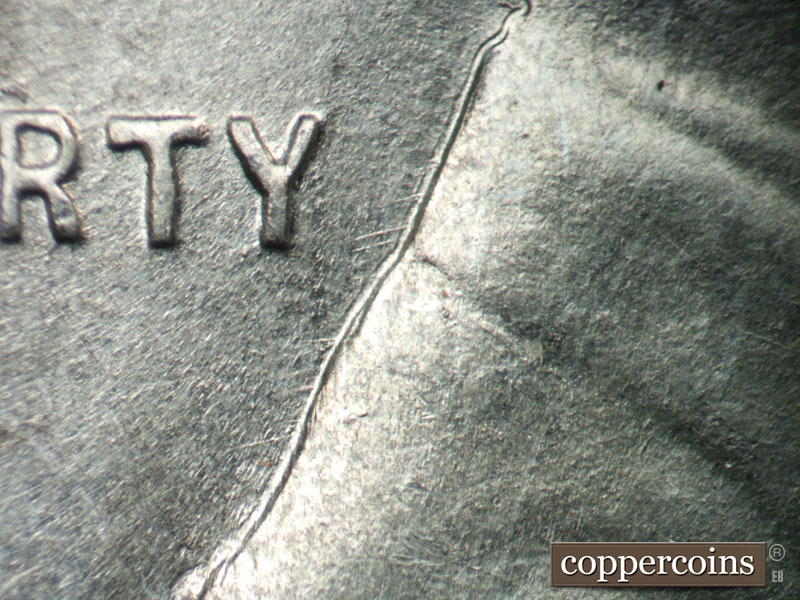 Die-stage B marker on 1943P•1DO•030 (1943 Doubled Die Obverse).