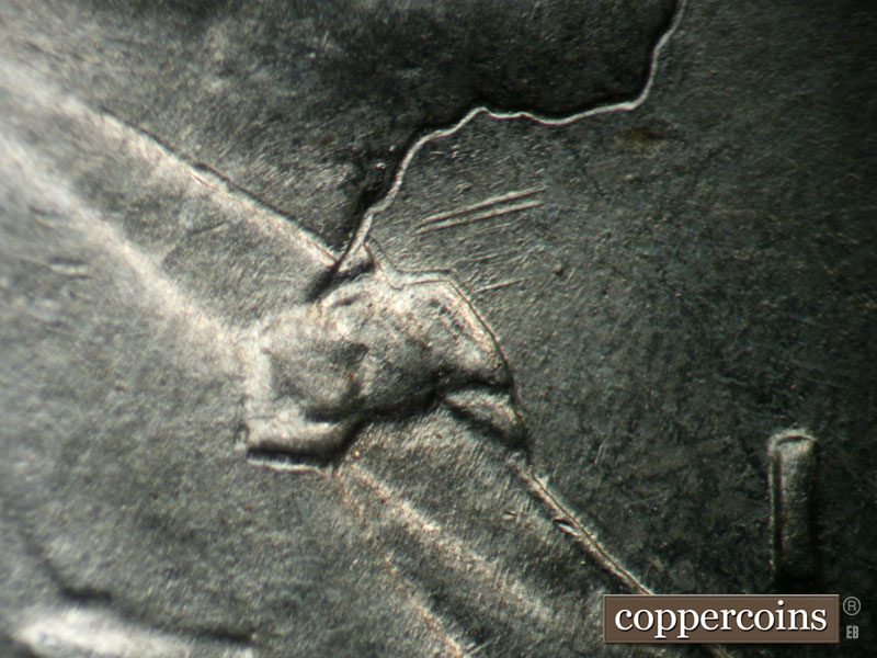 Die-stage B marker on 1943P•1DO•030 (1943 Doubled Die Obverse).