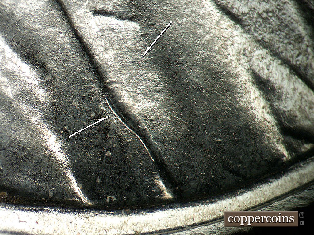 Die-stage A marker on 1943P•1DO•031 showing Light E/W die scratches on lapel, no die crack as shown in stage B.
