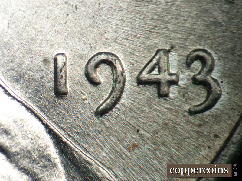 Die-stage B marker on 1943P•1DO•031 showing Die pitting between 19 in date.