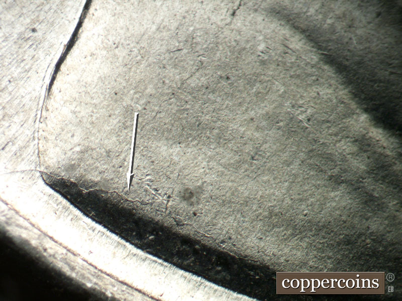 Die-stage B marker on 1943P•1DO•031 showing Die crack from rim over VDB.