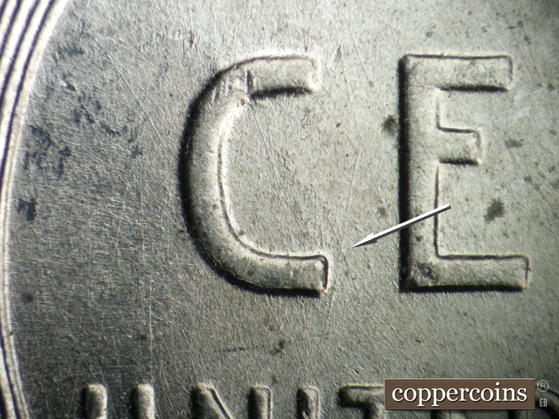 Die-stage B marker on 1943P•1DO•031 showing NNE die scratch in front of C in CENT.