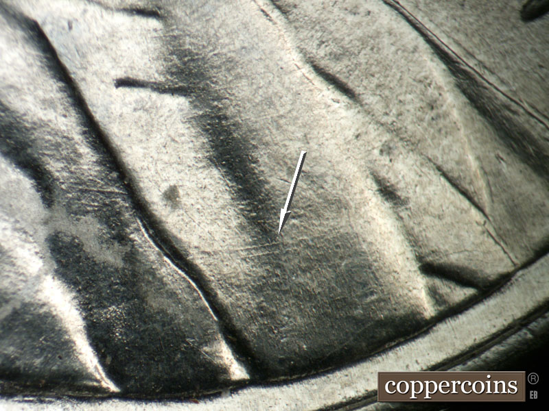 Die-stage B marker on 1943P•1DO•032 (1943 Doubled Die Obverse).