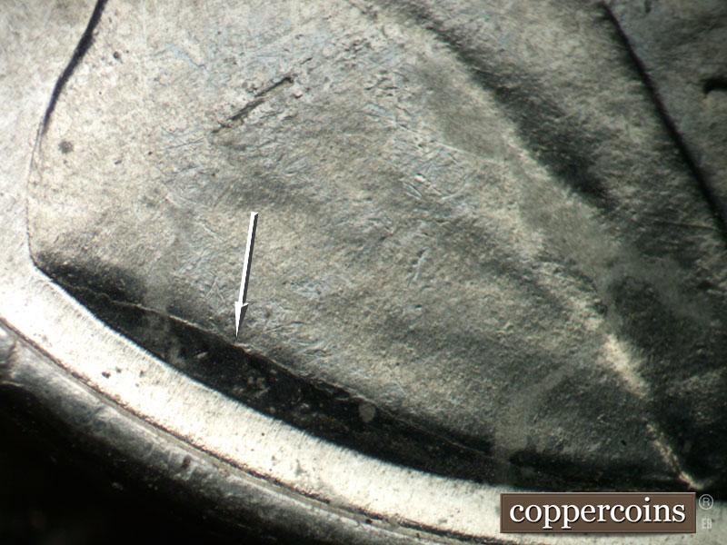 Die-stage B marker on 1943P•1DO•032 (1943 Doubled Die Obverse).