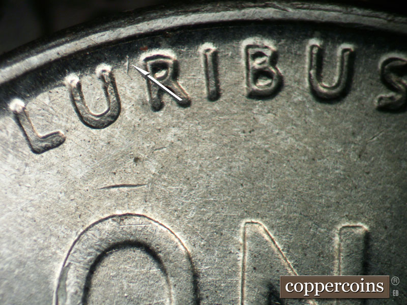 Die-stage B marker on 1943P•1DO•032 (1943 Doubled Die Obverse).