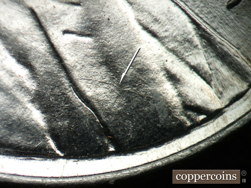 Die-stage B marker on 1943P•1DO•033 (1943 Doubled Die Obverse).