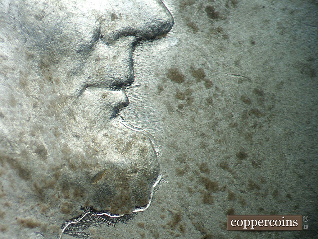 Die-stage B marker on 1943P•1DO•039 showing Short ENE die scratches from mouth.