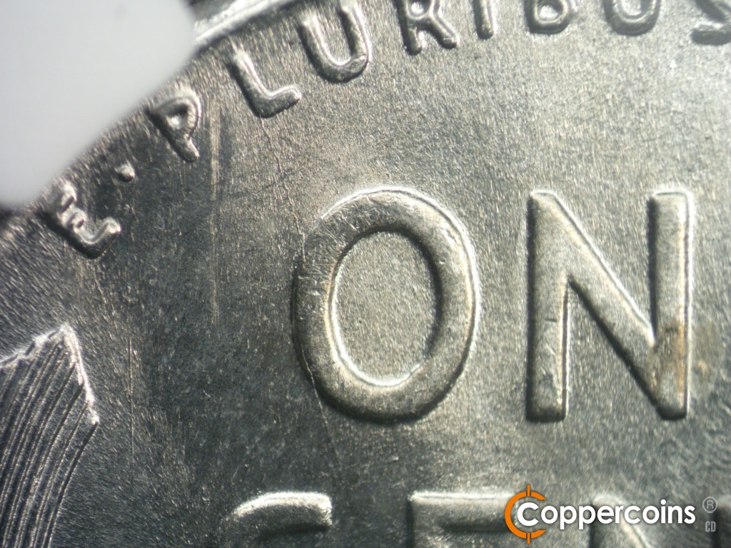 Die-stage B marker on 1943P•1DO•040 showing Die crack runs from the L of PLURIBUS to the left edge of the O of ONE.