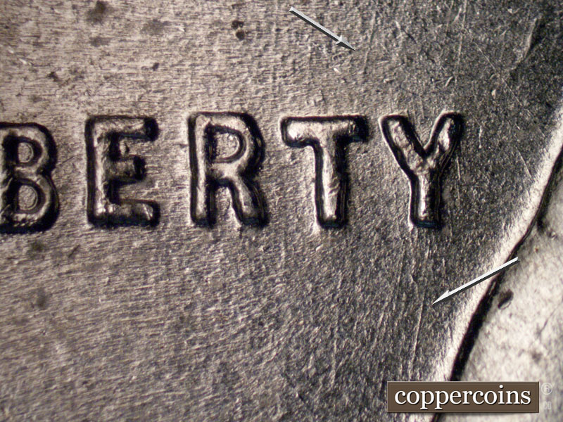 Die-stage B marker on 1943P•1DR•002 (1943 Doubled Die Reverse).