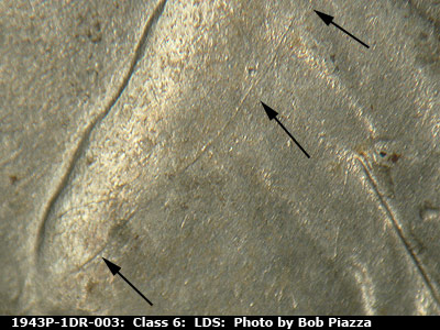 Die-stage C marker on 1943P•1DR•003 (1943 Doubled Die Reverse).