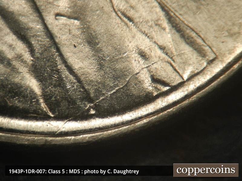 Die-stage B marker on 1943P•1DR•007 (1943 Doubled Die Reverse).