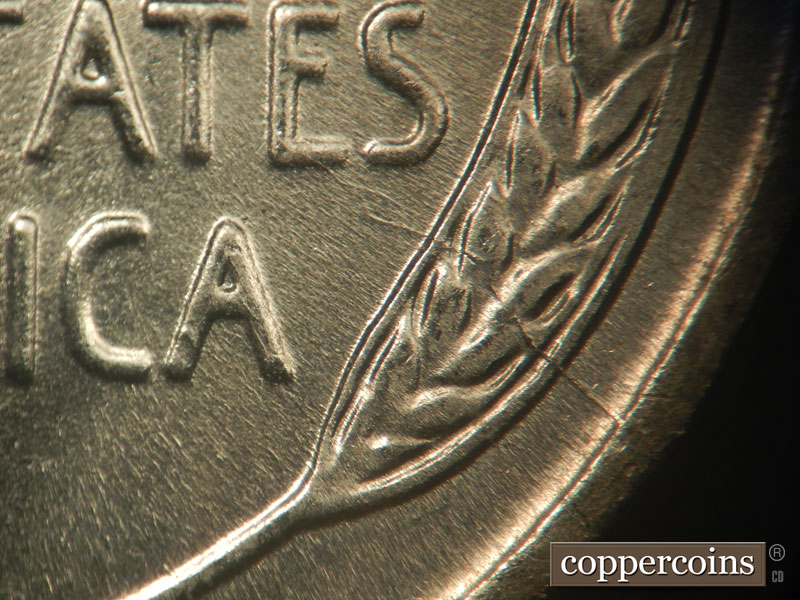 Die-stage B marker on 1943P•1DR•008 (1943 Doubled Die Reverse).