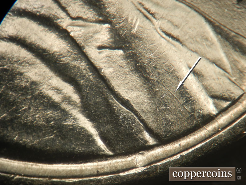 Die-stage B marker on 1943P•1DR•008 (1943 Doubled Die Reverse).