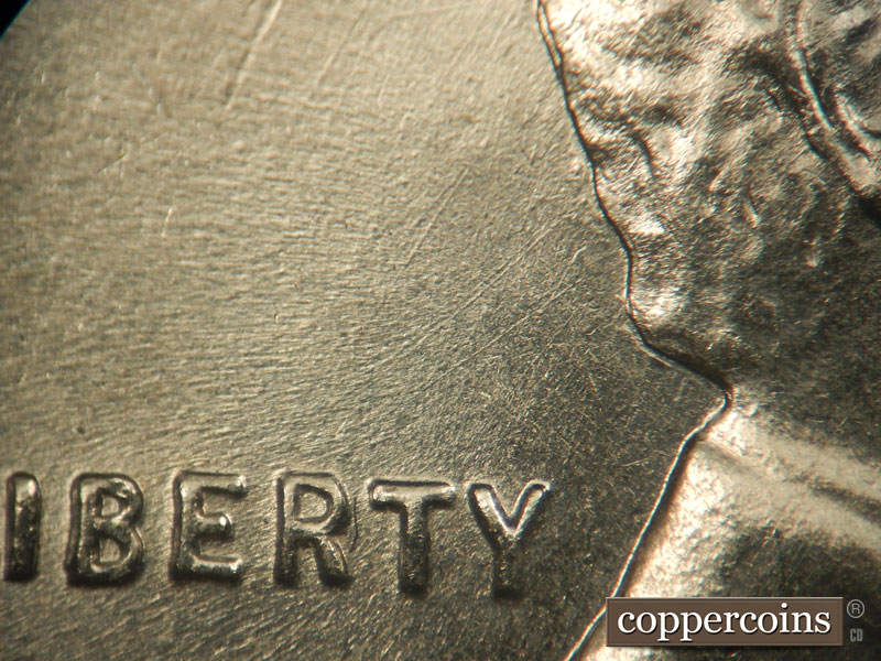 Die-stage B marker on 1943P•1DR•008 (1943 Doubled Die Reverse).