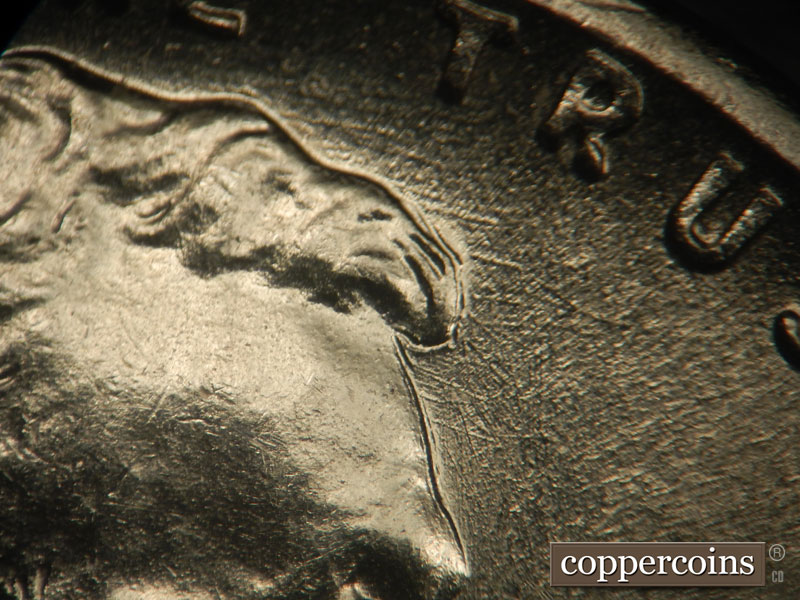 Die-stage B marker on 1943P•1DR•008 (1943 Doubled Die Reverse).