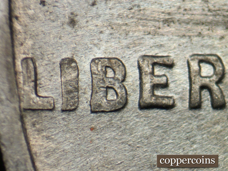 Die-stage B marker on 1943S•1DO•003 (1943 Doubled Die Obverse).