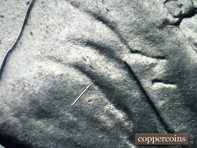 Die-stage B marker on 1943S•1DO•009 (1943 Doubled Die Obverse).