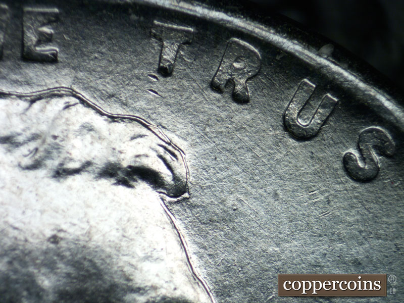 Die-stage B marker on 1943S•1DO•009 (1943 Doubled Die Obverse).