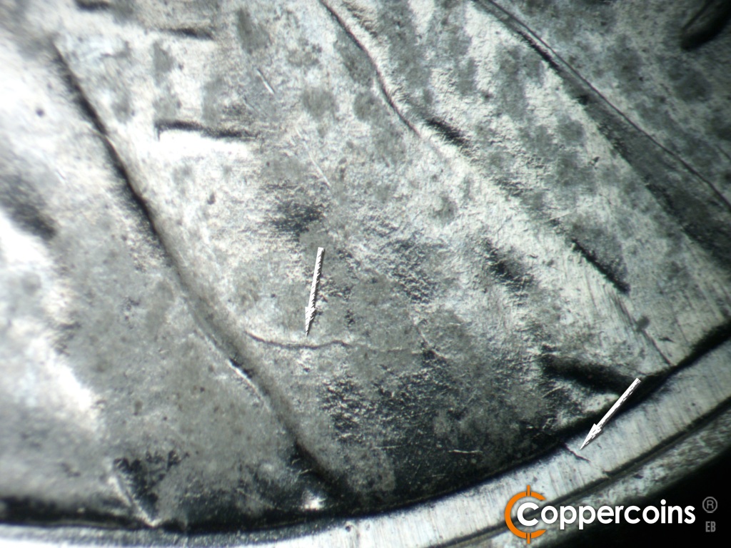 Die-stage C marker on 1943S•1DO•014 showing Die crack on lapel to rim.