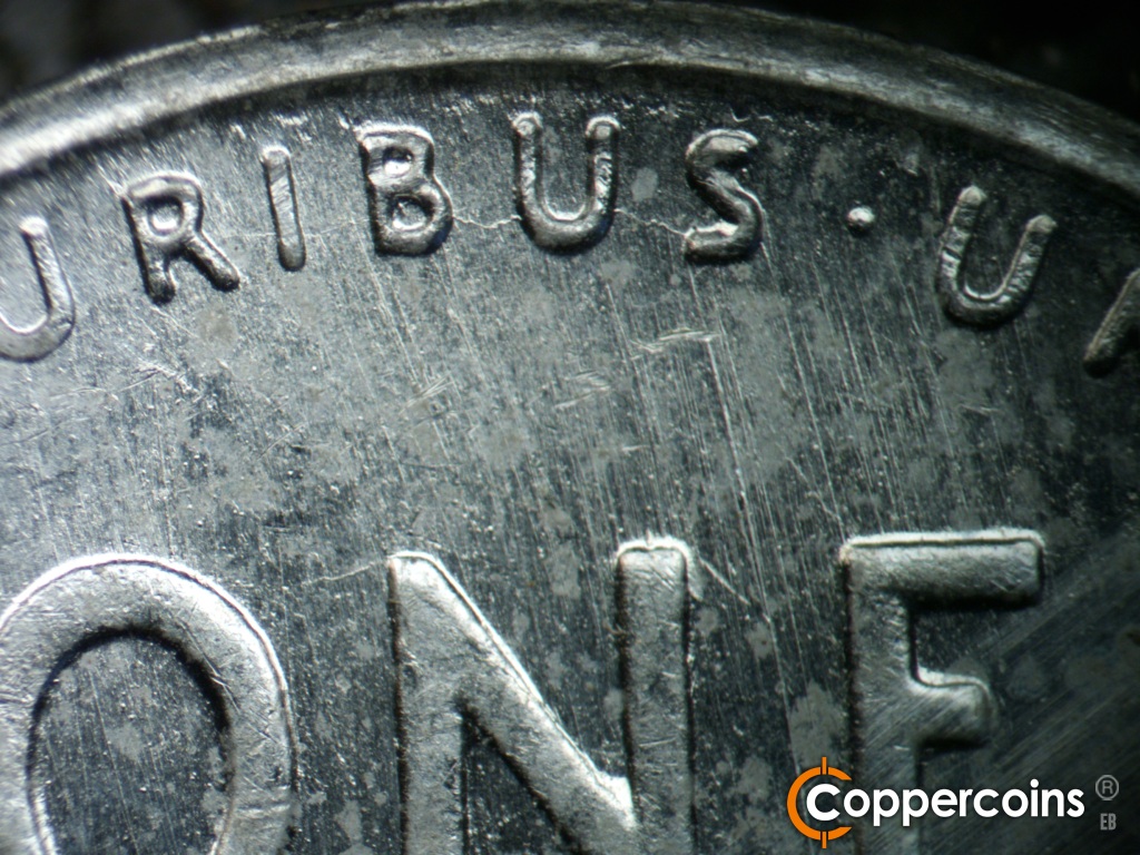 Die-stage C marker on 1943S•1DO•014 showing Die crack through PLURIBUS.